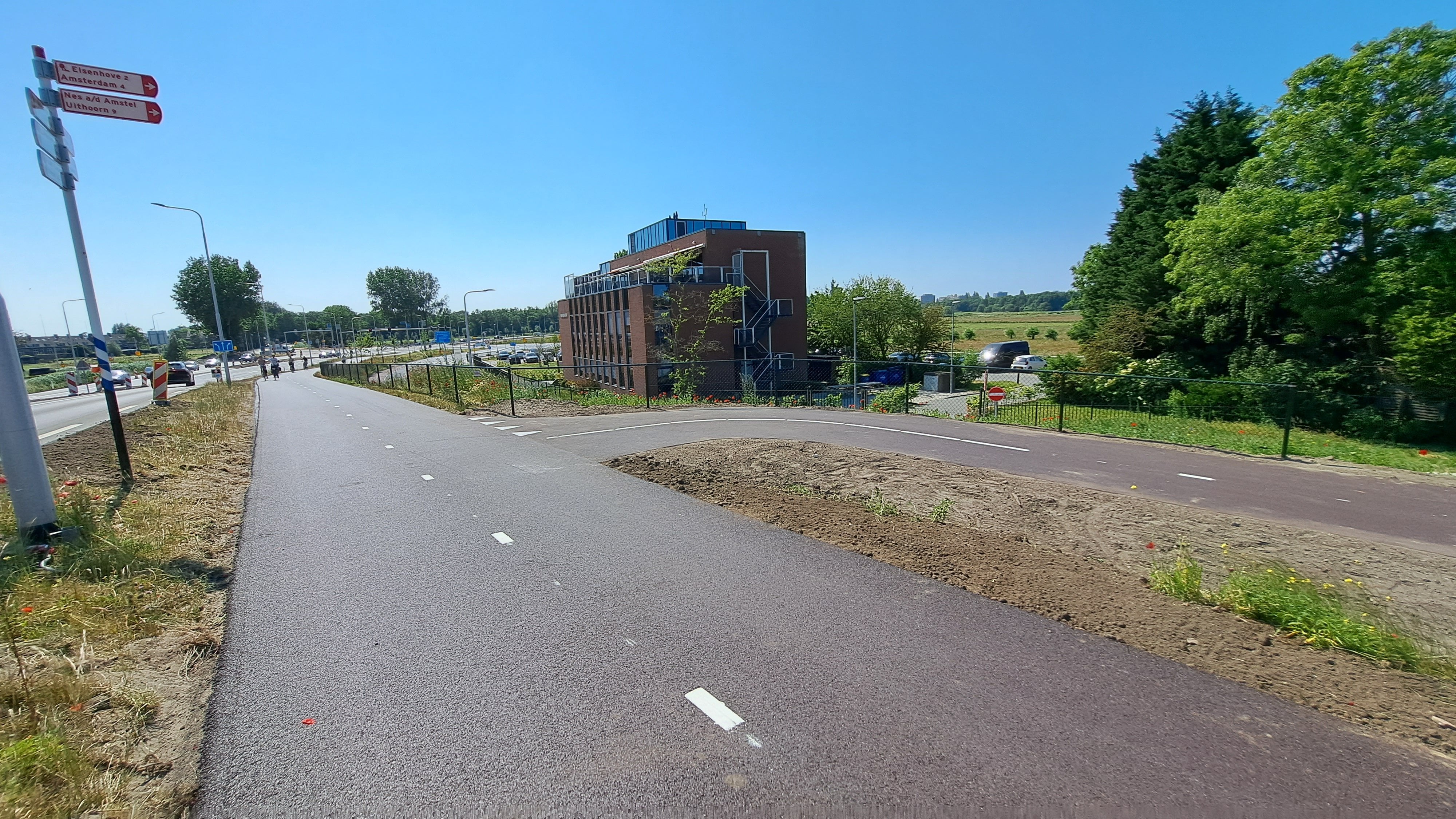 Foto 13: Hekwerk bij T-kruising fietspad op de Oranjebaan.