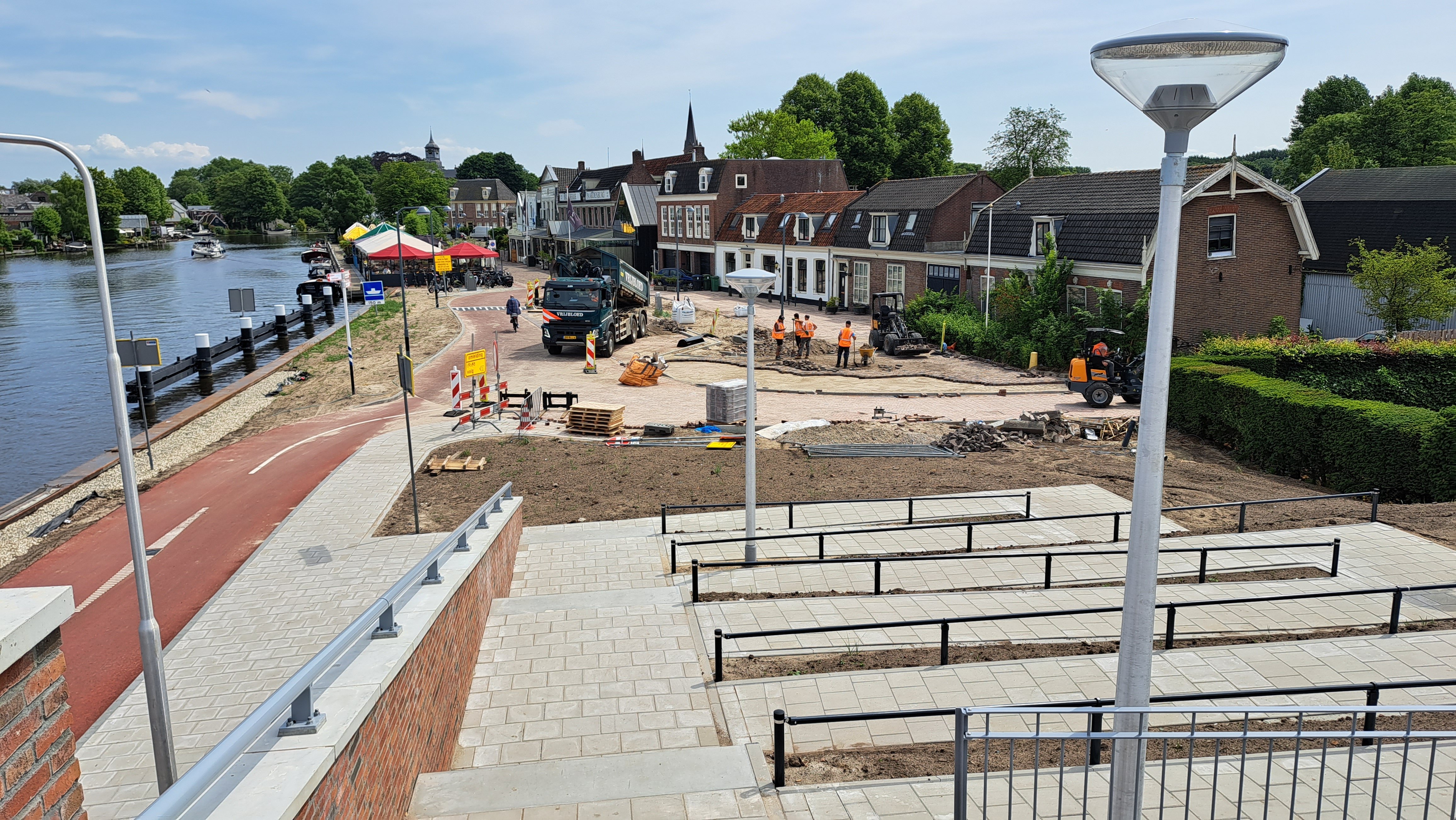 Foto 2: Straatwerk bij de nieuwe bocht in de Amstelzijde