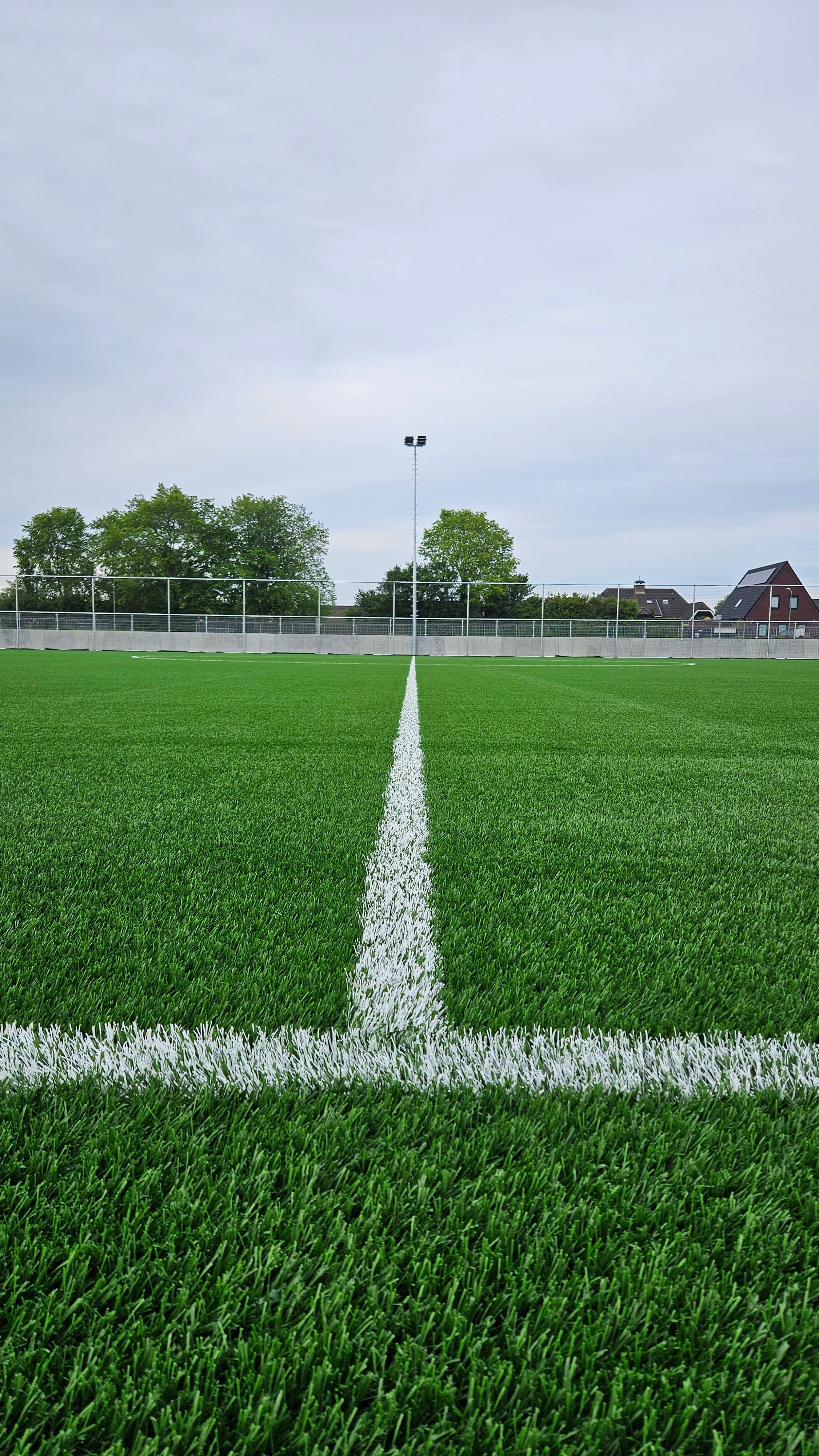 Middenlijn kunstgrasveld (voor het instrooien van zand)